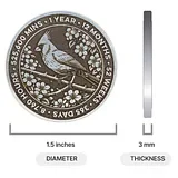 Photo of round silver sobriety coin with cardinal bird and flowers, showing 1.5 inch diameter and 3mm thickness measurements
